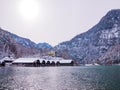 Beautiful view of traditional wooden boat port house at the shores of famous Lake Obersee KÃÂ¶nigssee