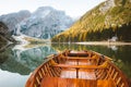 Traditional rowing boat on alpine lake in fall Royalty Free Stock Photo