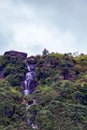 Scenic tropical waterfall in jungle Royalty Free Stock Photo