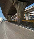 Beautiful view of Tumkur or Nelamangala 8 Lane Road with flyover, metro pillar and metro stop with limited traffic jam on road