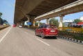 Beautiful view of Tumkur or Nelamangala 8 Lane Road with flyover, metro pillar and metro stop with limited traffic jam on road