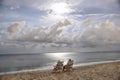 A beautiful view for two enjoying the moment at midnight on a tropical beachfront Royalty Free Stock Photo