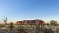 Beautiful view of Uluru at dawn with the Olgas Mountains in the background, Australia