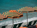 Beautiful view of the umbrellas and beach chairs on a beach with the Mediterranean Sea Royalty Free Stock Photo