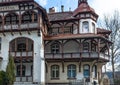 Beautiful view on urban white exterior house facade with scenic red roof in old narrow street of historic portuguese