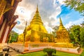 Beautiful view of Wat Phra Singh temple with golden chedi stupa and pagoda in Chiang Mai city, Thailand. Symbol of buddhism and Royalty Free Stock Photo