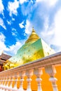 Beautiful view of Wat Phra Singh temple with golden chedi stupa and pagoda in Chiang Mai city, Thailand. Symbol of buddhism and Royalty Free Stock Photo