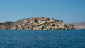 Beautiful view from the water of colorful Symi island in summer. Greece Royalty Free Stock Photo