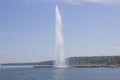 Beautiful view of the water jet fountain in the lake of Geneva, Switzerland. Geneva cityscape with its famous Jet d`Eau Royalty Free Stock Photo