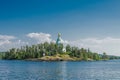 Beautiful view from the water to the island with the Orthodox Church. St. Nicholas Skete of the Valaam Monastery. Church of St. Royalty Free Stock Photo