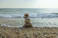 Beautiful view of waves oncoming on composition of stones.