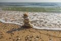 Beautiful view of waves oncoming on composition of stones.