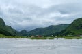 Beautiful view of white sand on a background of mountain hills in Refviksanden Beach