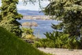 Beautiful view of a wide river with sunlit islands. Bright greenery on the shore. Dnieper River from a height, Ukraine. Royalty Free Stock Photo