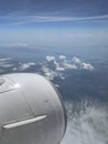 Beautiful View from Window of Airplane in The Sky. Flying and Traveling,View from Airplane Window on the Wing. Aerial View From Royalty Free Stock Photo