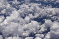 Beautiful view from window of plane flying over clouds. Natural panorama with clouds. Royalty Free Stock Photo