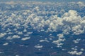 Beautiful view from window of plane flying over clouds. Natural panorama with clouds. Royalty Free Stock Photo