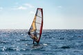 Beautiful view of windsurfer sailing on the waves. Windsurfing on the Black Sea. Yalta, Crimea Royalty Free Stock Photo