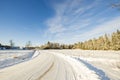 Beautiful view of winter scape. Country road in snow forest. Beautiful nature winter background. Royalty Free Stock Photo