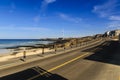 Trunk road besides Woljeong Beach providing leading line at Jeju Island South Korea Royalty Free Stock Photo