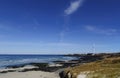 Woljeong Beach with white windmill at far right at Jeju Island South Korea bac Royalty Free Stock Photo