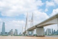 Beautiful view of the Wuhan Bridge with fluffy white clouds in the clear blue sky