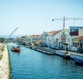 Beautiful views of downtown Aveiro in Portugal overlooking the river and houses in a Portuguese town