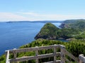 Beautiful views hiking the east coast trail from a lookout Below is the vast atlantic ocean, rugged headlands, and green forests