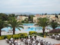 Beautiful views of the hotel grounds where there is an outdoor restaurant and swimming pools. pilot beach resort, crete, greece -