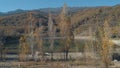 Beautiful views of lake near the mountains and trees. Shot. Amazing autumn landscape