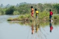 Beautiful views of nature on the banks of a river in West Bengal where some village boys are playing