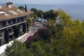 Beautiful villa against the backdrop of the Mediterranean is immersed in spring flowers.