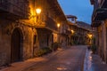 Beautiful village of Cartes illuminated at night, in Cantabria, Spain