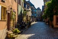 Beautiful village Riquewihr with historic buildings and colorful houses in Alsace of France - Famous vine route Royalty Free Stock Photo