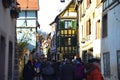 Beautiful village Riquewihr with historic buildings and colorful houses in Alsace of France - Famous vine route. Royalty Free Stock Photo