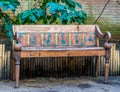 Beautiful vintage bench in egyptian style, Seat decorated with symbols, historical looking objects