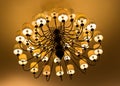 Beautiful vintage chandelier with multiple light bulbs. Royalty Free Stock Photo