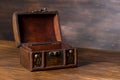 beautiful vintage chest with open lid on wooden background, closeup Royalty Free Stock Photo