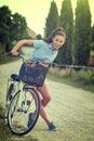 Beautiful vintage girl sitting next to bike, summer time Royalty Free Stock Photo