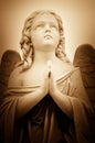 Beautiful vintage image of a praying angel Royalty Free Stock Photo