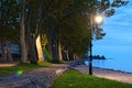 Beautiful vintage lantern near Lake Balaton. Amazing autumn morning landscape. Lake Balaton and Plane tree alley in Balatonfoldvar