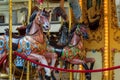 Beautiful vintage retro merry-go-round carousel wooden horses Royalty Free Stock Photo