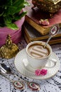 Beautiful vintage still life with flowers, books, a Cup and bell Royalty Free Stock Photo