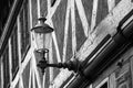 Beautiful vintage street lamp on a brick wall. Black and white photo. Architecture Royalty Free Stock Photo