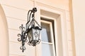 Beautiful vintage street lamp hanging on wall of building Royalty Free Stock Photo