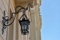 Beautiful vintage street lamp hanging on wall of building Royalty Free Stock Photo