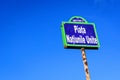 Vintage street sign showing Piata Natiunile Unite (United Nations Square) displayed on an street in the city center of Royalty Free Stock Photo