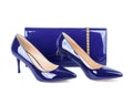 Beautiful violet shoes with clutches on white isolated Royalty Free Stock Photo