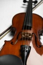 Beautiful violin and bow on grey table