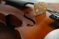 Beautiful violin on wooden table, closeup